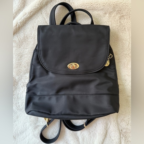 Travelon Anti-Theft Small Tailorer Backpack Black with Magenta Lining - Picture 10 of 11